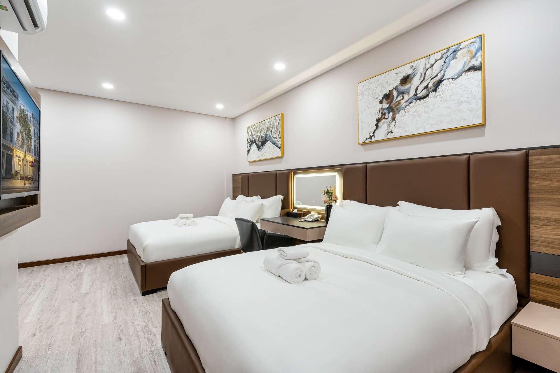 Hệ thống phòng ngủ với thiết kế sang trọng, hiện đại - khách sạn Vĩnh Long